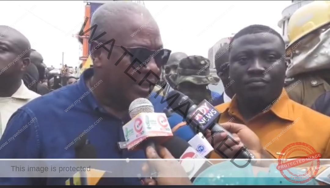 President Mahama at fire scene in Kumasi, Adum